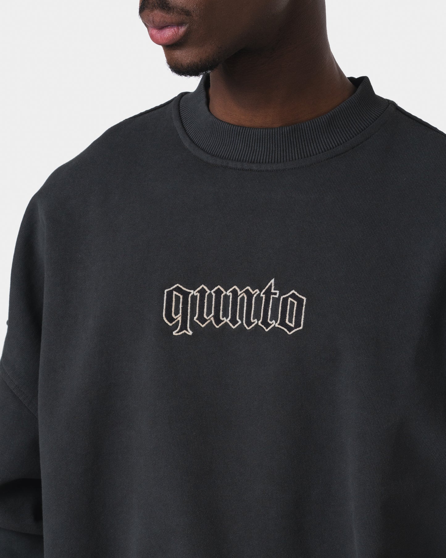 ESSENTIAL BLACK SWEATER